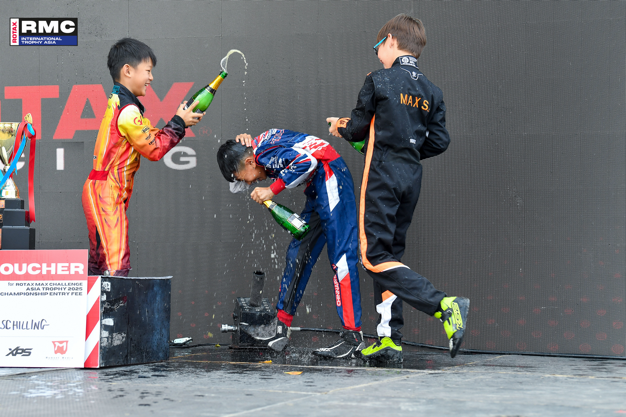 RMCIT Asia Micro MAX Winners on the podium celebrating